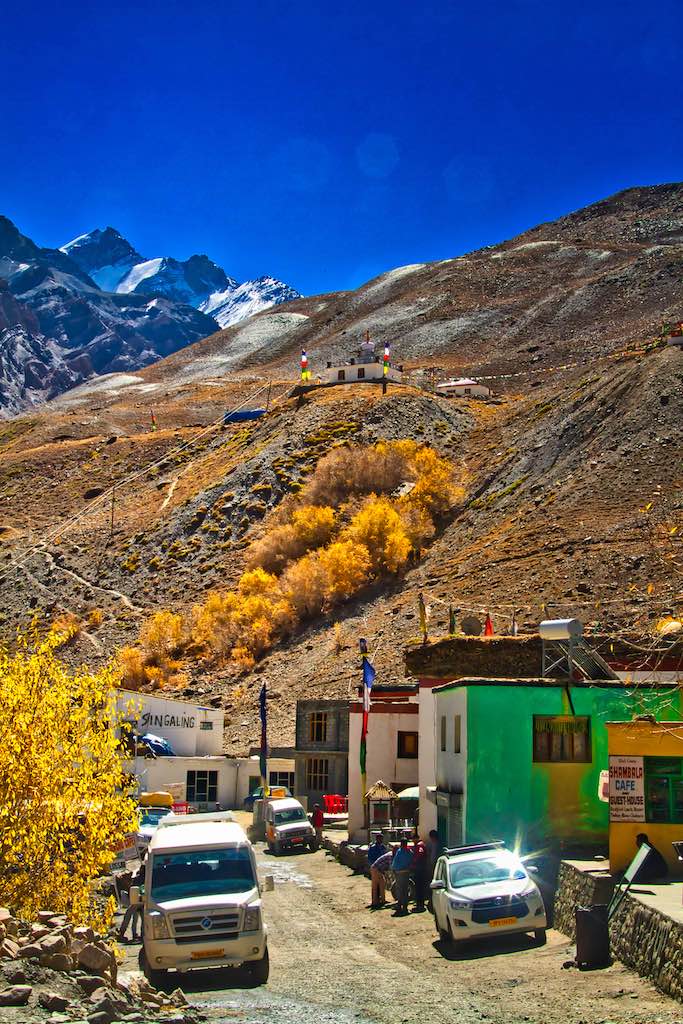 Losar - the every present chorten overlooks the village Losar - the every present chorten overlooks the village