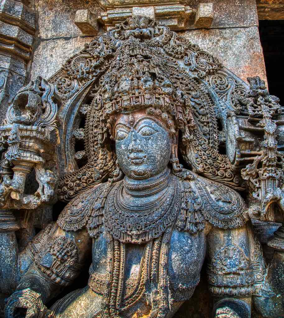 A close-up of the Dwarapala showing the intricate details of the carvings A close-up of the Dwarapala showing the intricate details of the carvings