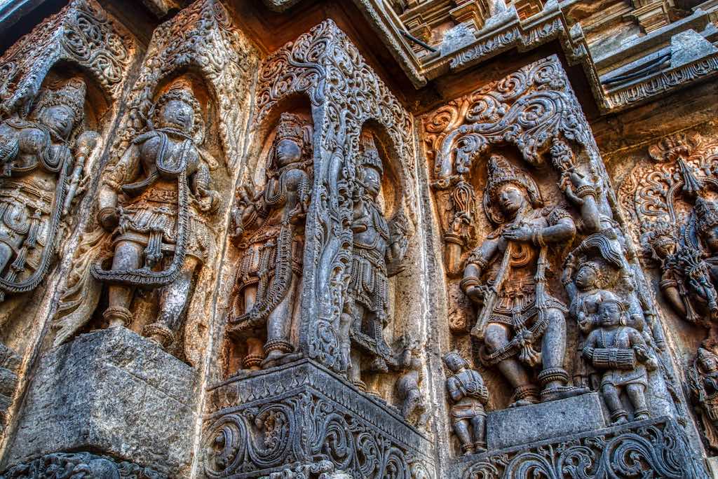The complex carvings on the external wall The complex carvings on the external wall