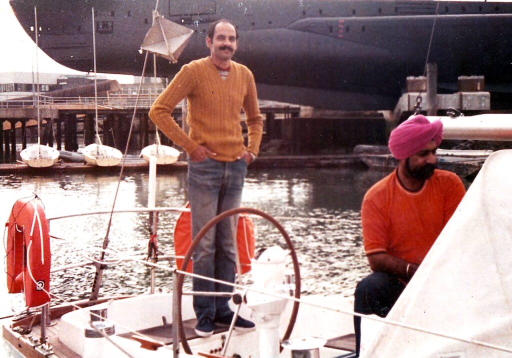 Working on the boat at JSSC; HMS Alliance at the Submarine Museum can be seen in the background