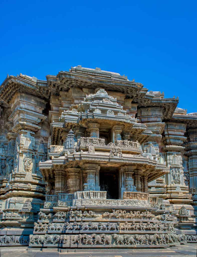 A grand miniature temple carved along the external walls