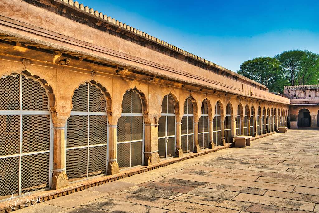 Pillared verandas line the stepwell