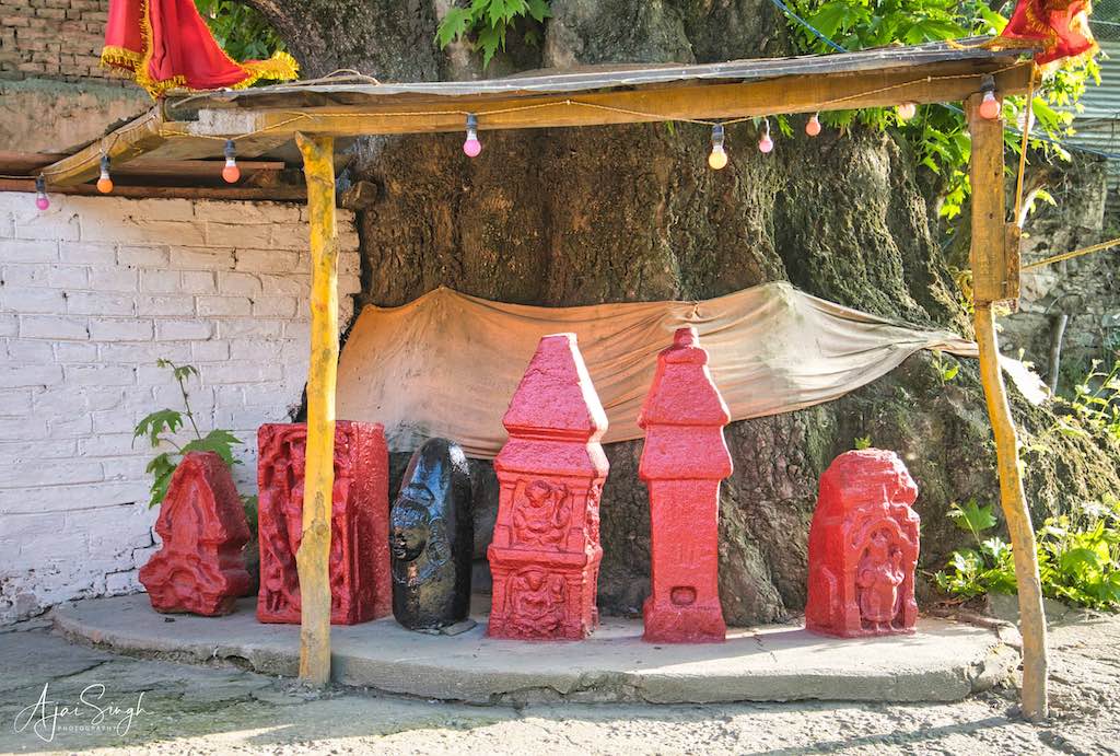 Ancient pieces of the original shrine lie in the compound