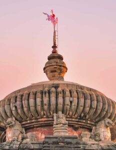 Pennants flutter high over the 7th century Lingaraj Temple at Bhubaneswar