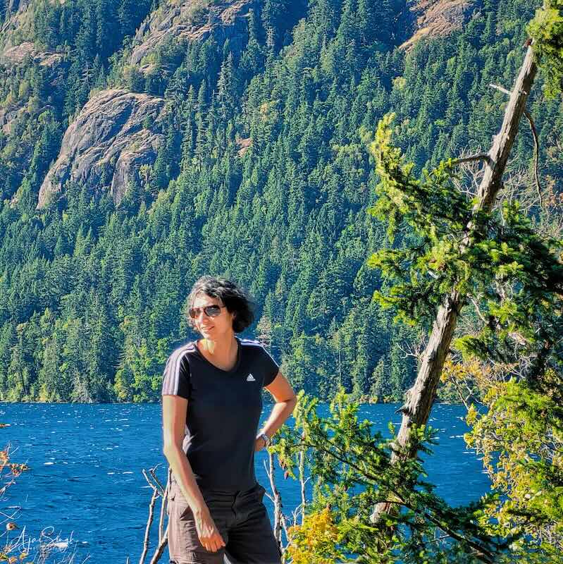 Enjoying the sun while waiting for our side traffic to open by Cameron Lake